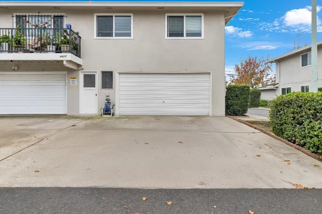 a view of a house with a garage