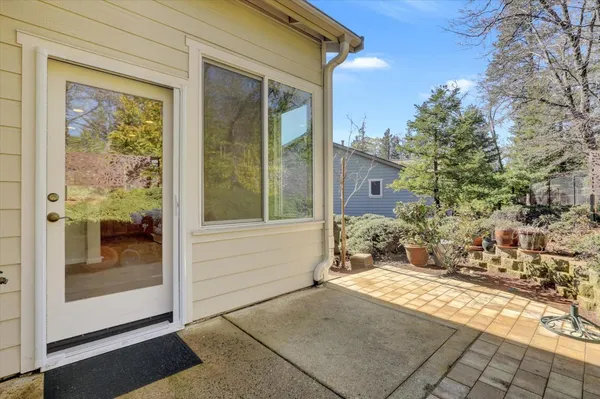 a view of a backyard of the house