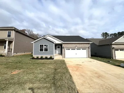a house with yard in front of it