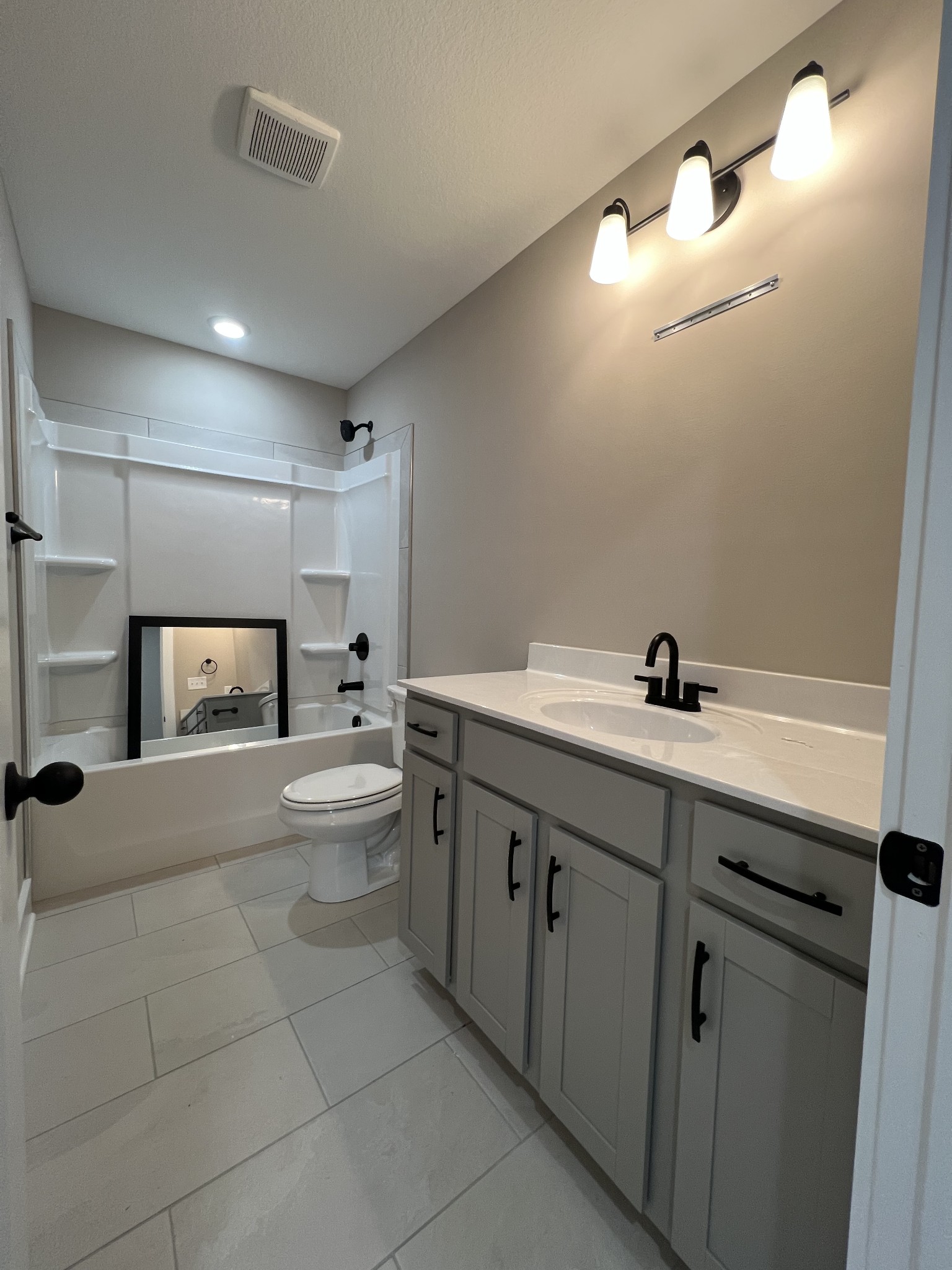 280 Cardinal Crk Drive Clarksville, TN 37040 - Photo 5 of 17 a bathroom with a double vanity sink and mirror