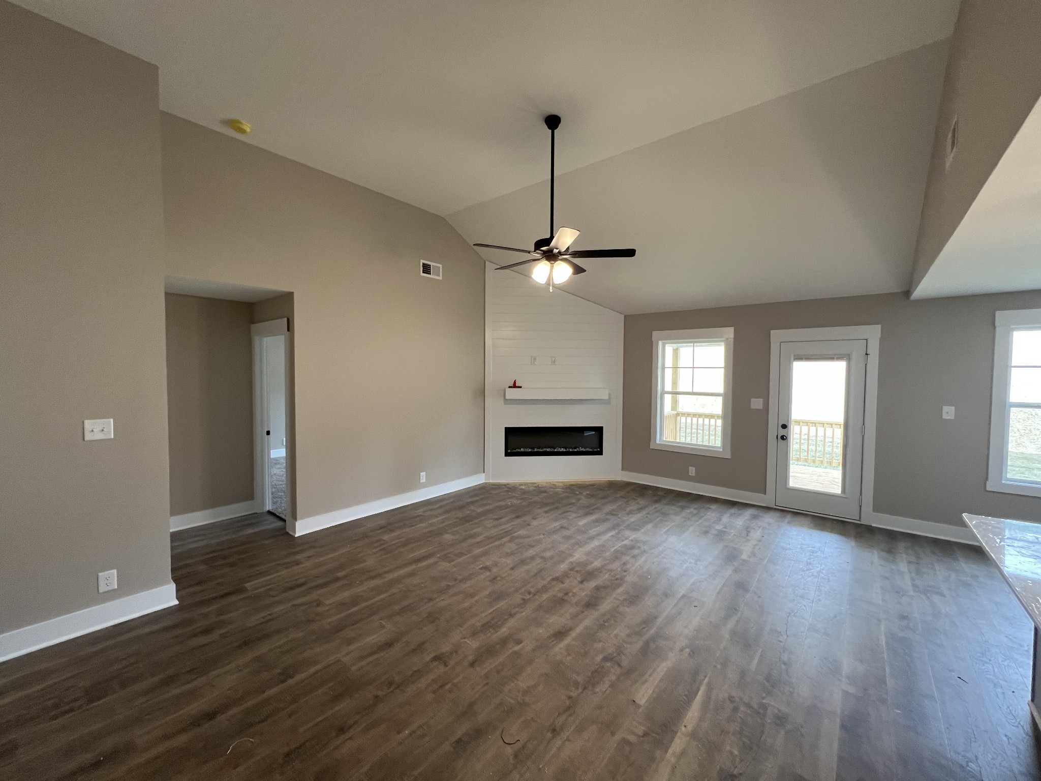 280 Cardinal Crk Drive Clarksville, TN 37040 - Photo 8 of 17 a view of an empty room with window and wooden floor