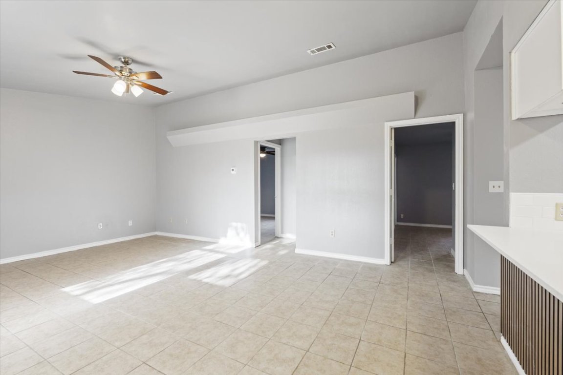 23393 Nameless Road, Unit 156 Leander, TX 78641 - Photo 11 of 21 a view of an empty room with a ceiling fan