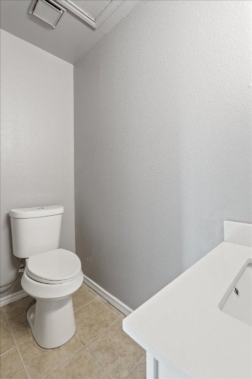 23393 Nameless Road, Unit 156 Leander, TX 78641 - Photo 21 of 21 a white toilet sitting next to a white sink