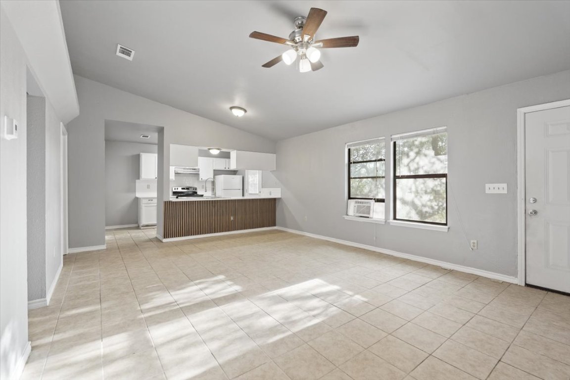 23393 Nameless Road, Unit 156 Leander, TX 78641 - Photo 5 of 21 a view of kitchen and windows