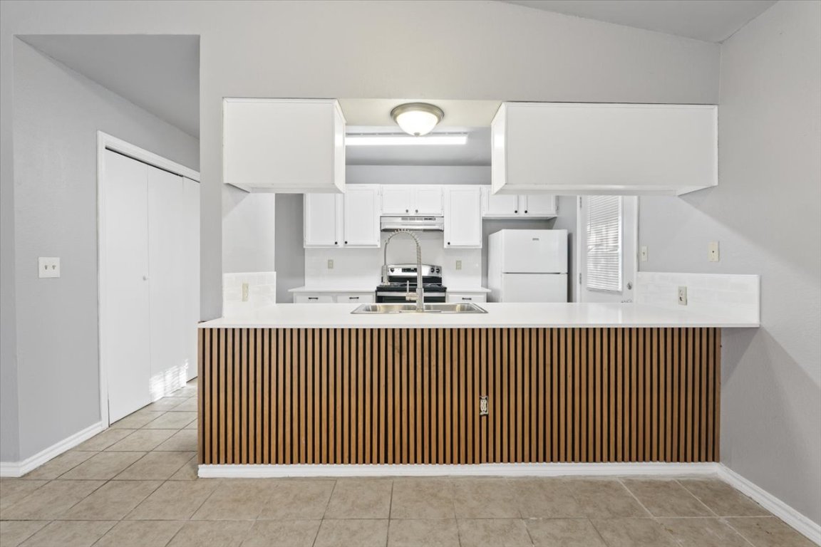 23393 Nameless Road, Unit 156 Leander, TX 78641 - Photo 6 of 21 a view of kitchen with sink