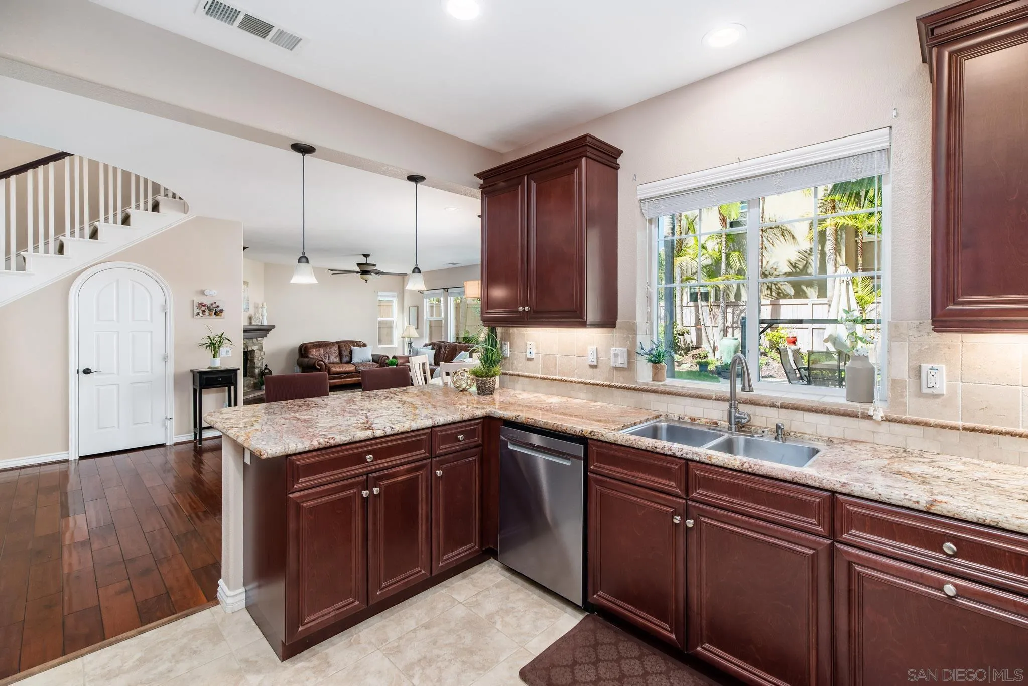 650 Liquid Amber Way San Marcos, CA 92078 - Photo 16 of 48 a kitchen with a sink stove top oven and refrigerator