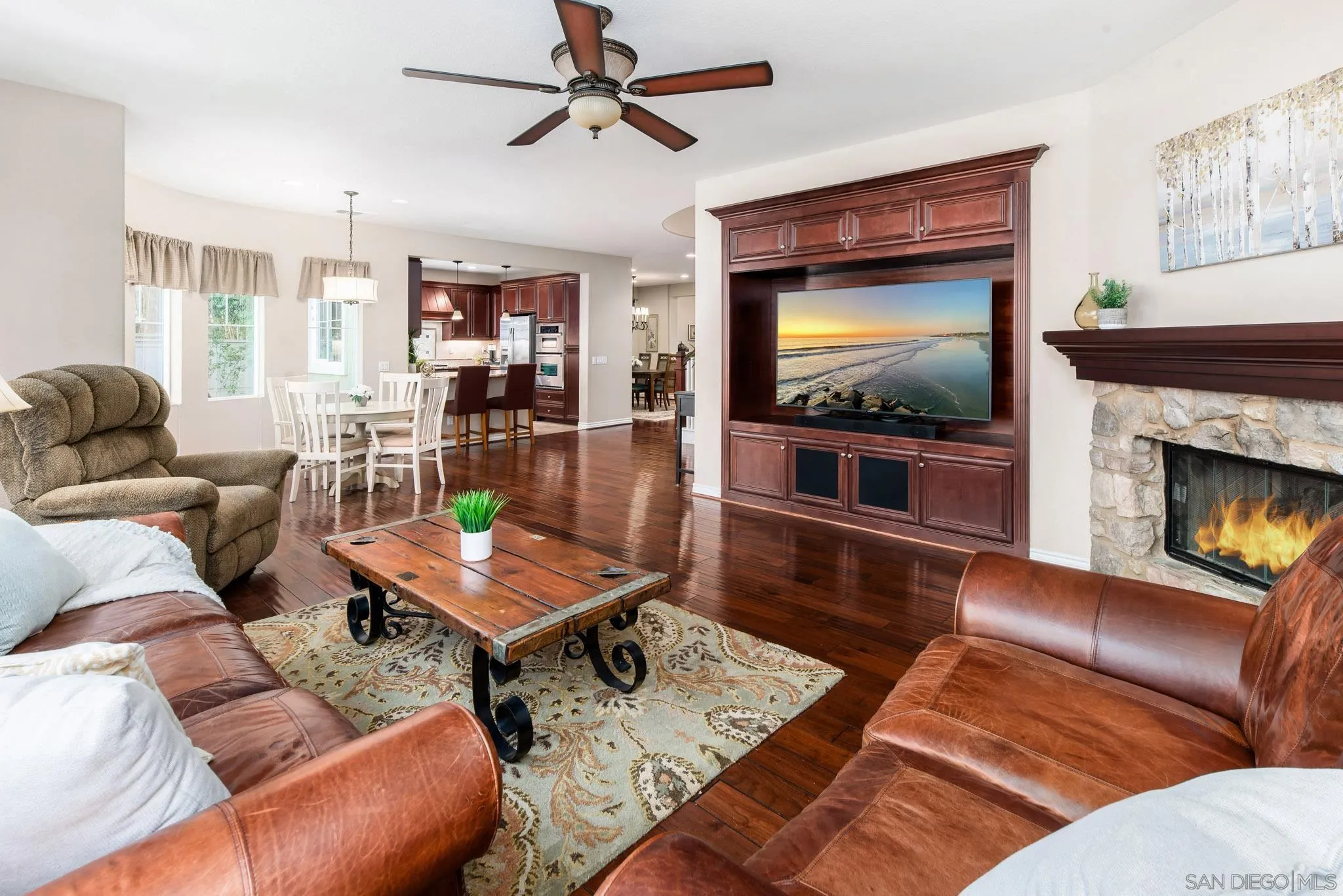 650 Liquid Amber Way San Marcos, CA 92078 - Photo 19 of 48 a living room with furniture and a flat screen tv