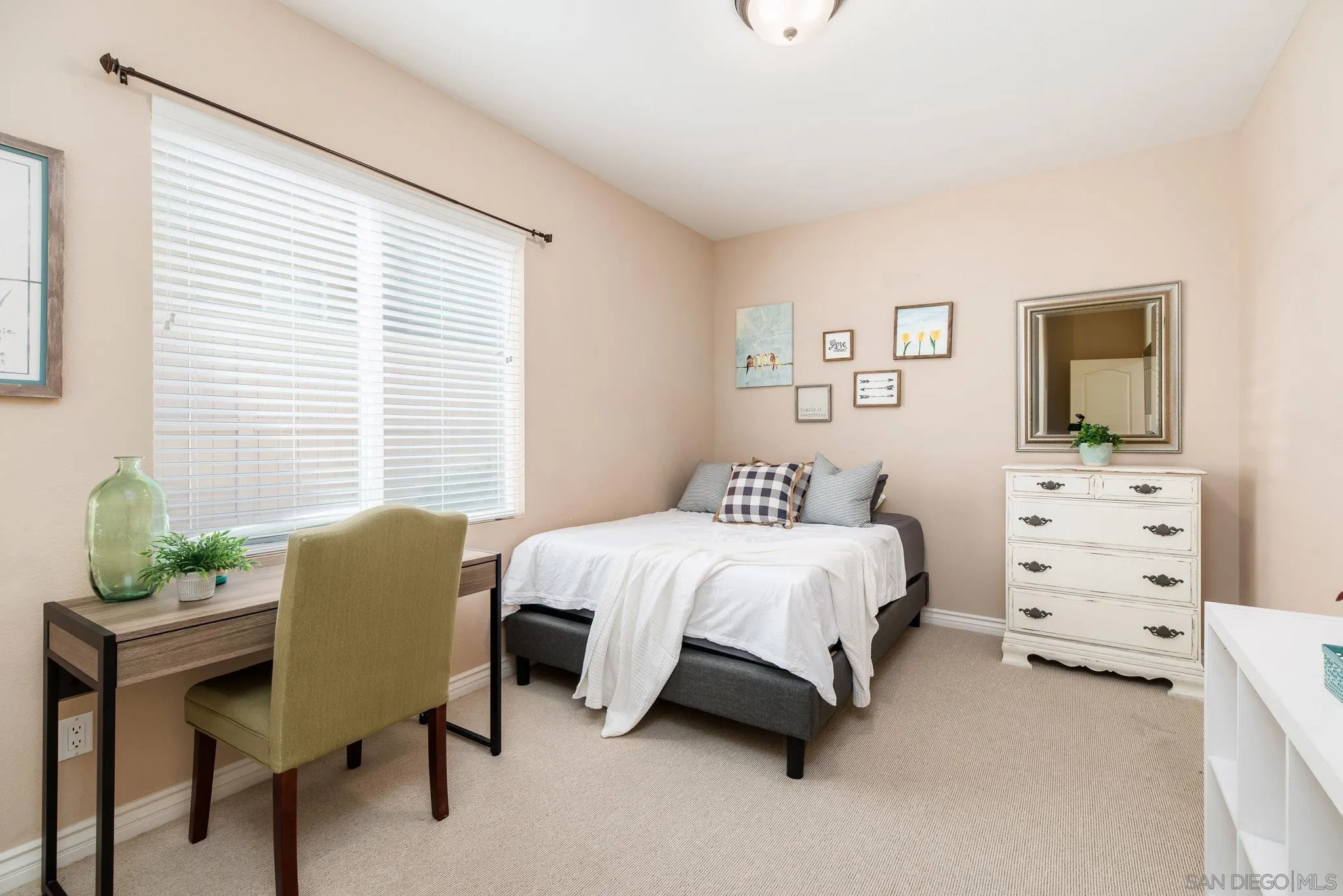 650 Liquid Amber Way San Marcos, CA 92078 - Photo 22 of 48 a bedroom with a bed chair and window