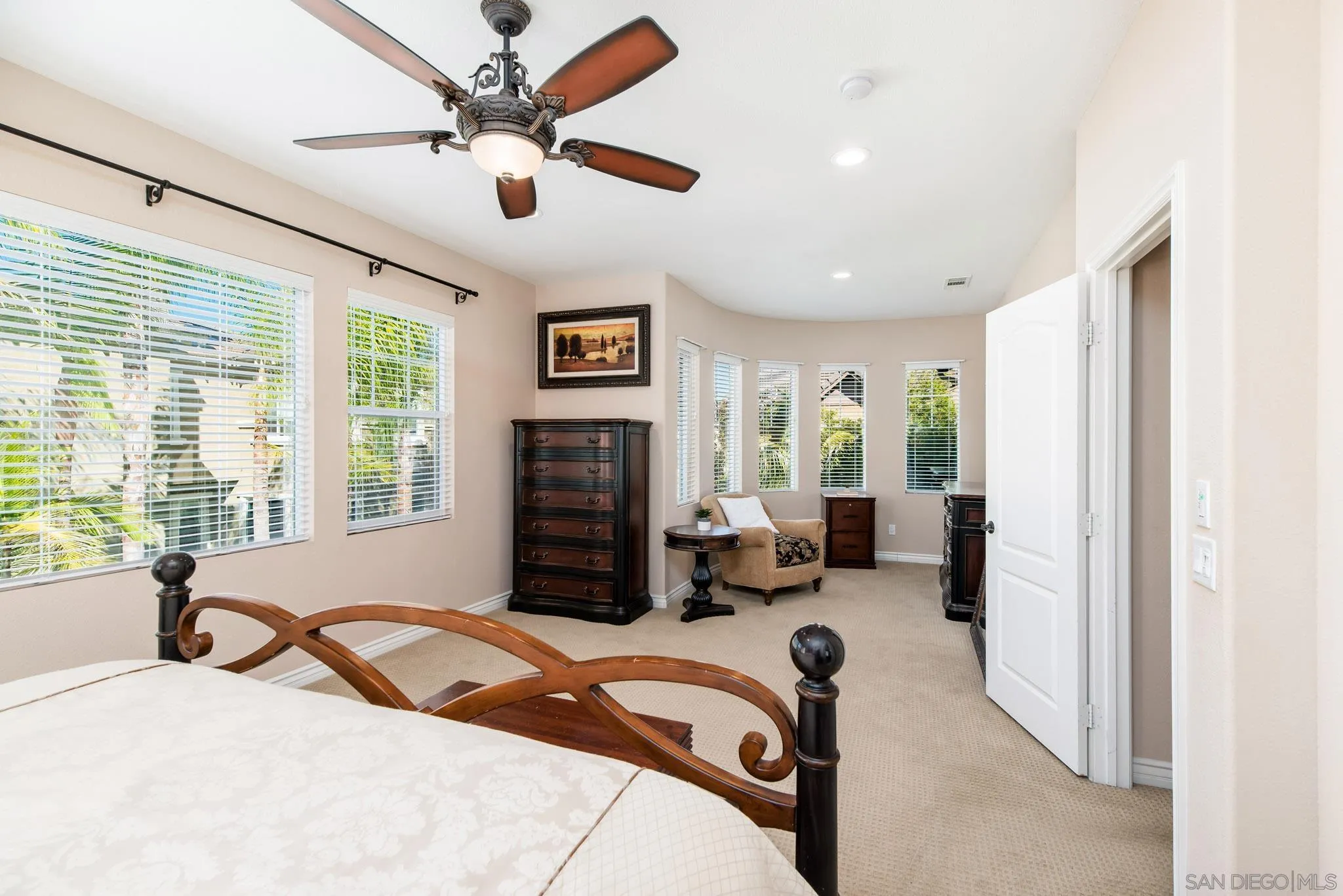 650 Liquid Amber Way San Marcos, CA 92078 - Photo 27 of 48 a bedroom with furniture and a large window
