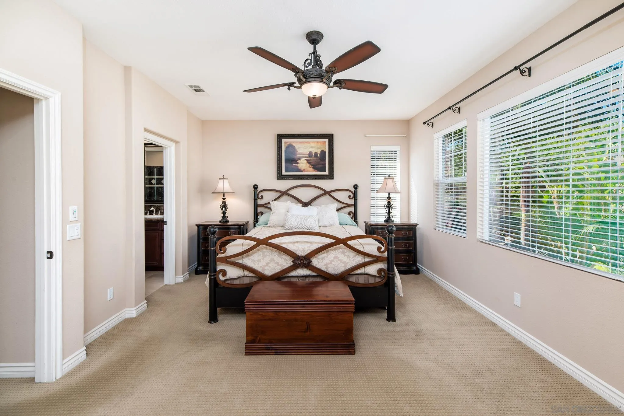 650 Liquid Amber Way San Marcos, CA 92078 - Photo 29 of 48 a bedroom with a bed and window