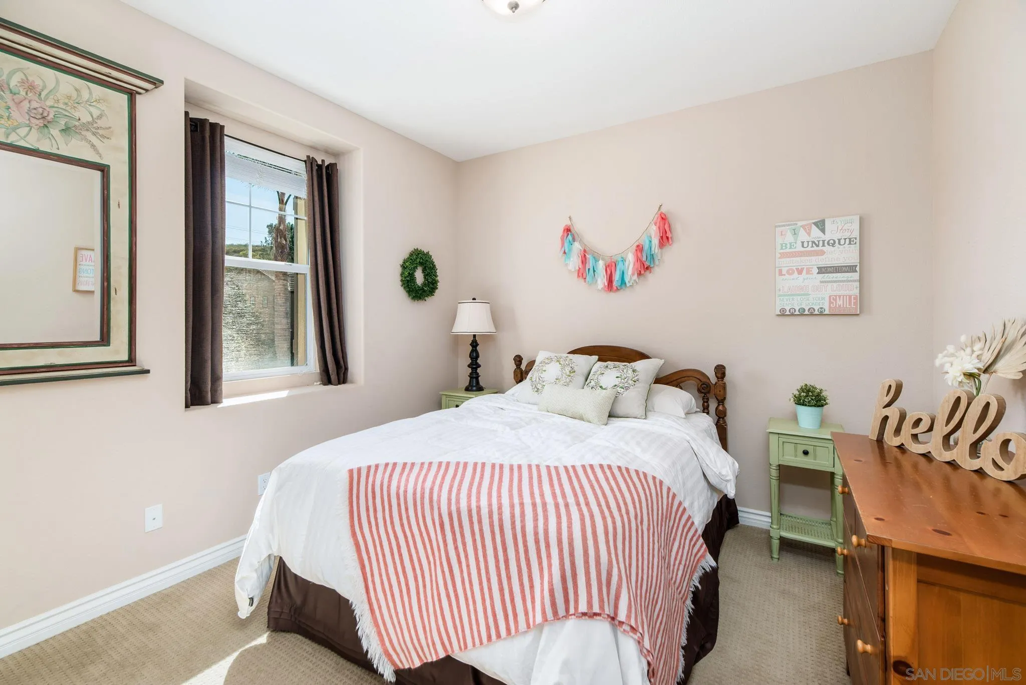 650 Liquid Amber Way San Marcos, CA 92078 - Photo 33 of 48 a bedroom with a bed and a window