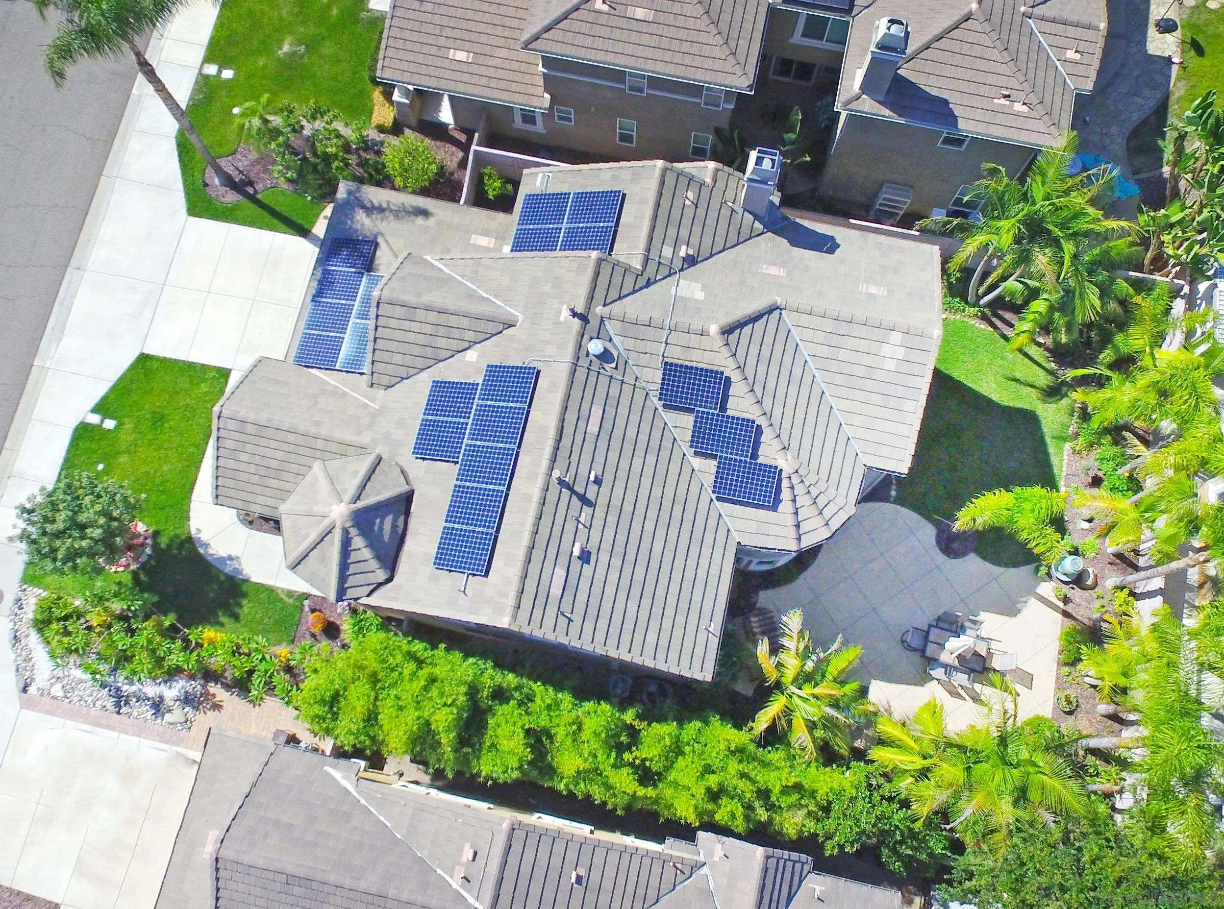 650 Liquid Amber Way San Marcos, CA 92078 - Photo 4 of 48 a aerial view of a house with a yard and garden