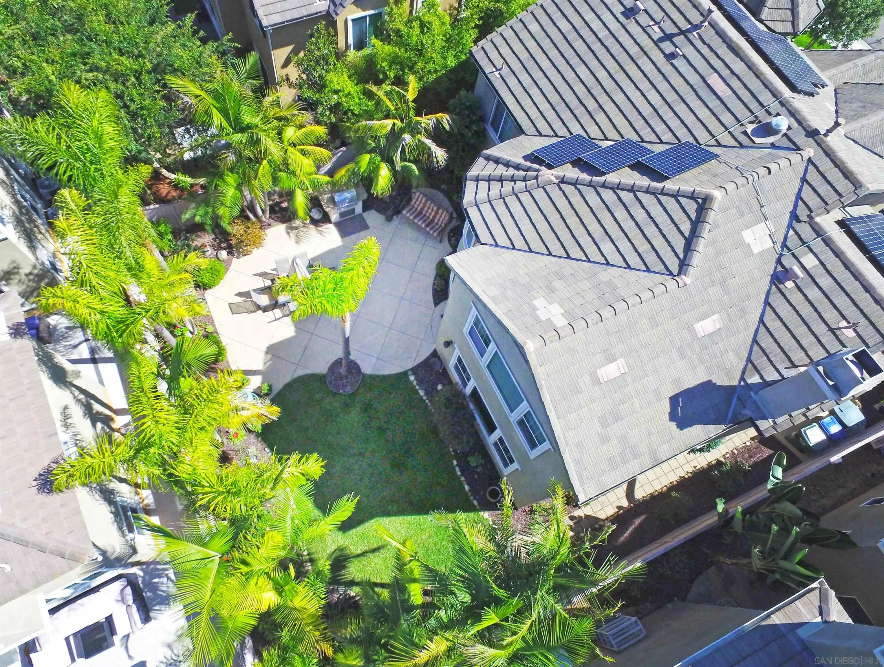 650 Liquid Amber Way San Marcos, CA 92078 - Photo 45 of 48 a view of a backyard with sitting area