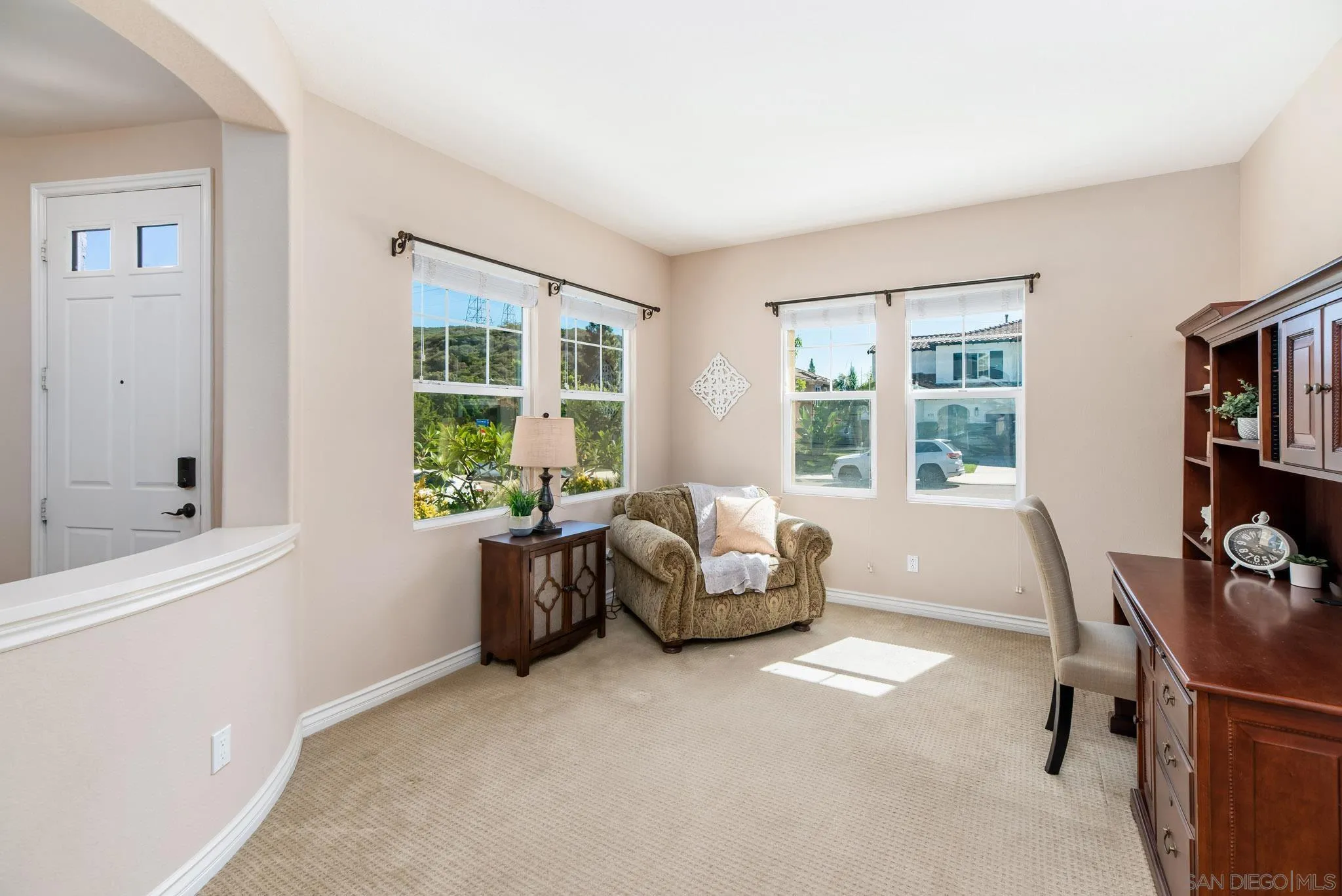 650 Liquid Amber Way San Marcos, CA 92078 - Photo 10 of 48 a living room with furniture and a window