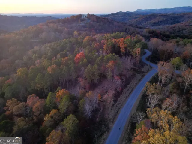 a view of a house with a mountain