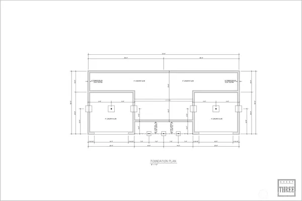 a black and white photo of a living room