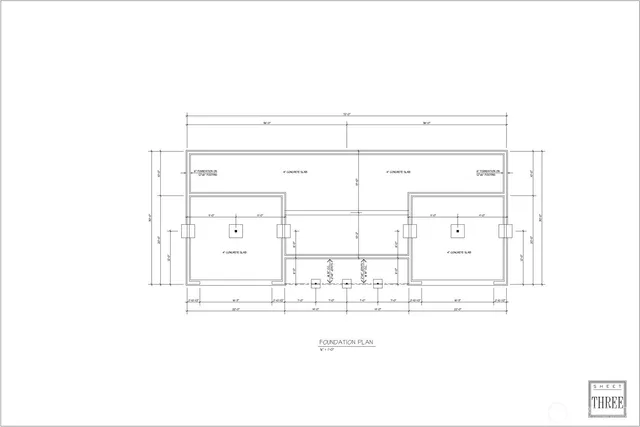 a black and white photo of a living room