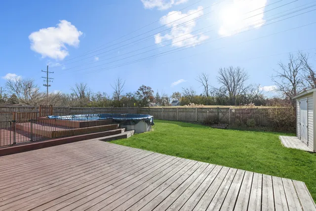 a view of a terrace with yard