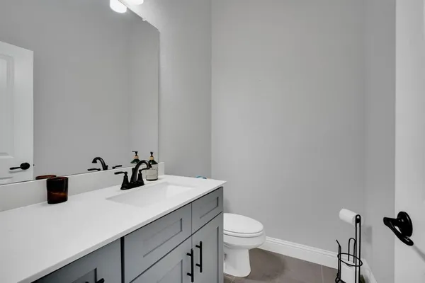 a bathroom with a sink and a toilet