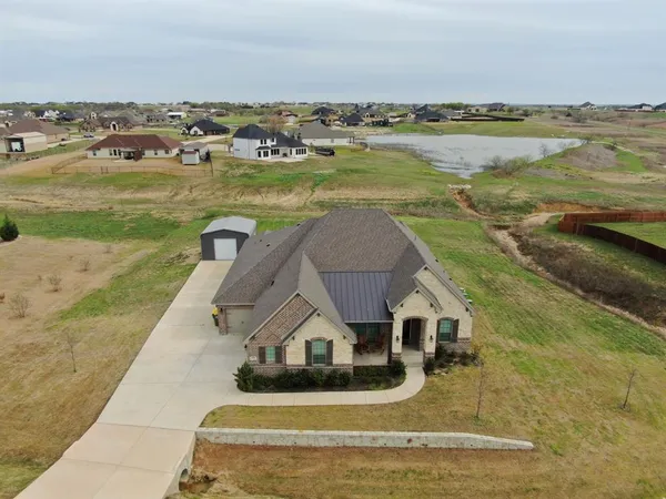 a view of a lake with a big yard