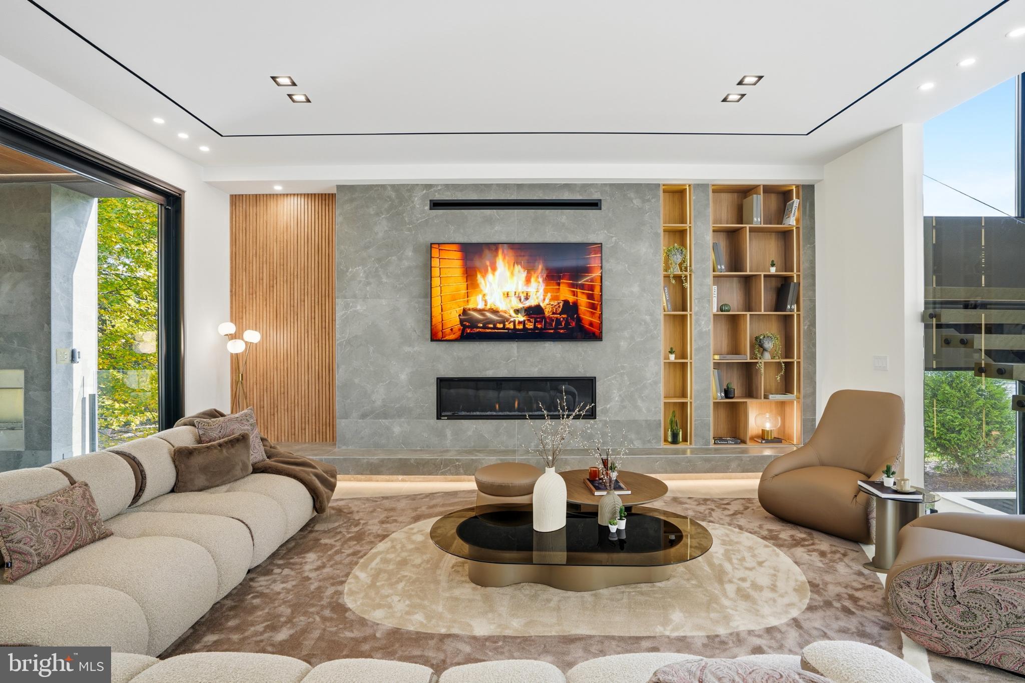 9408 Old Courthouse Road Vienna, VA 22182 - Photo 18 of 92 Modern elegance with a cozy fireplace glow.