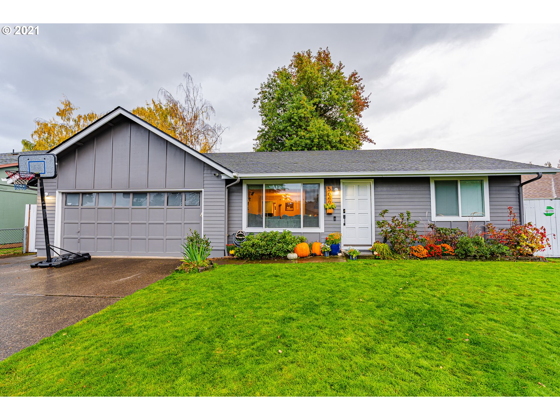 5649 E Street Springfield, OR 97478 - Photo 1 of 19 a front view of house with yard and green space