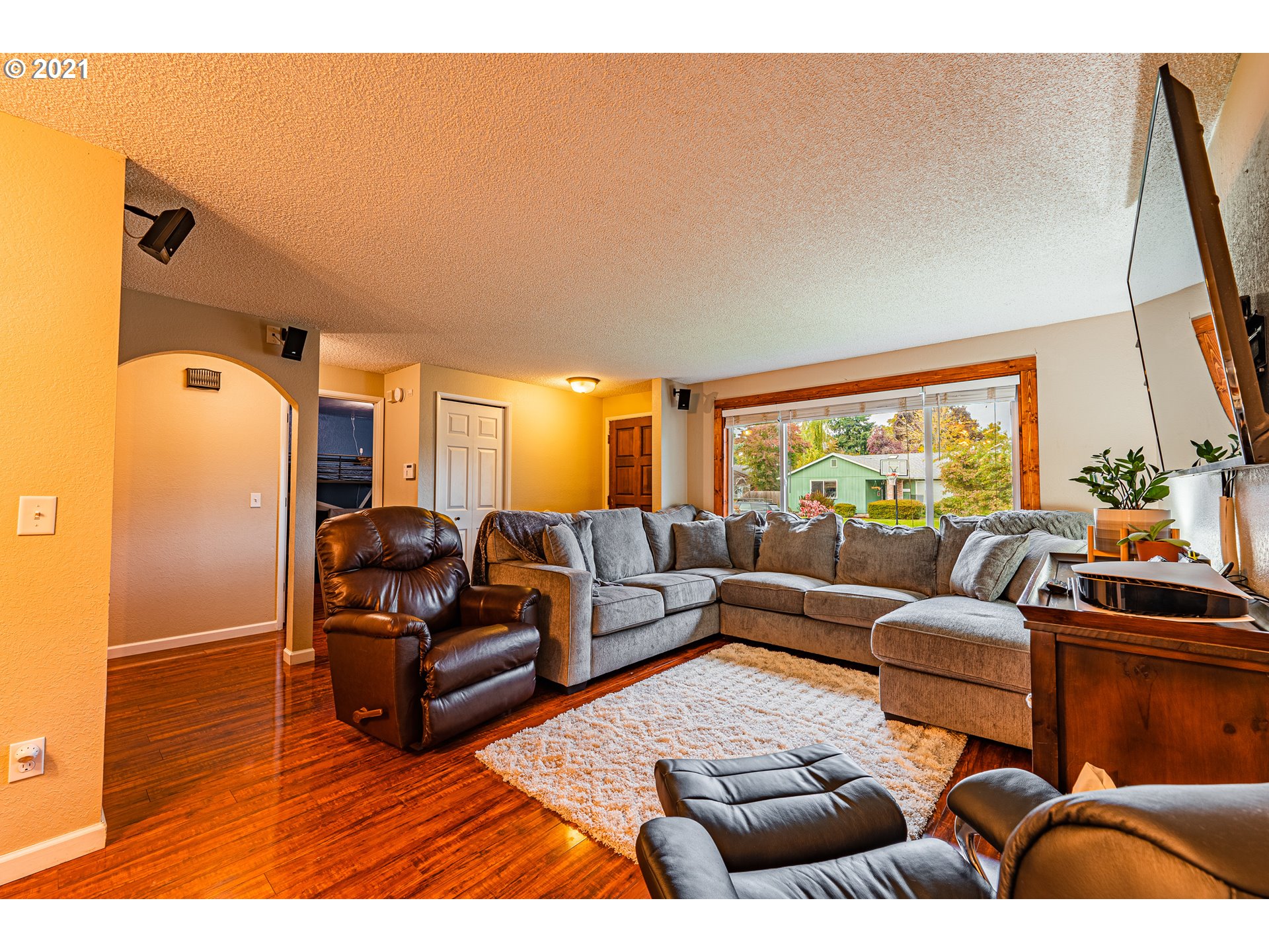 5649 E Street Springfield, OR 97478 - Photo 2 of 19 a living room with furniture and a large window