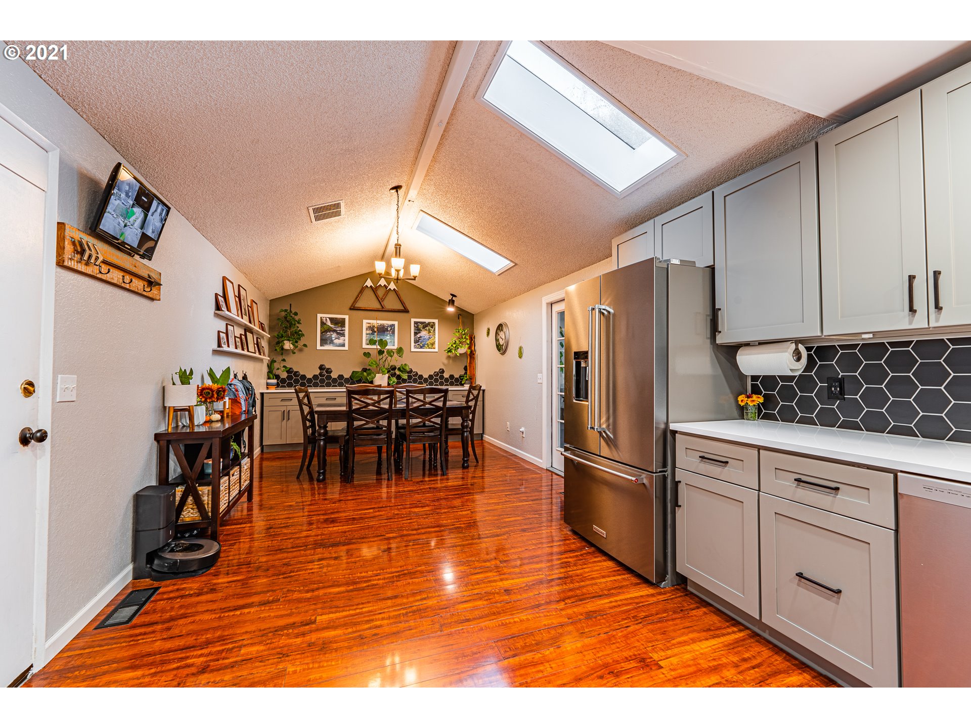 5649 E Street Springfield, OR 97478 - Photo 5 of 19 a kitchen with stainless steel appliances granite countertop a refrigerator and a sink