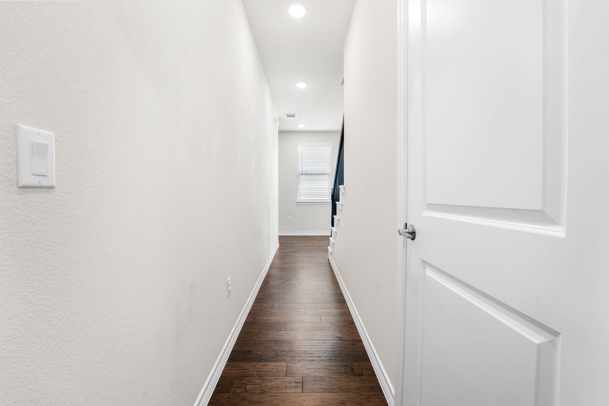 2803 Mary Elizabeth Drive Austin, TX 78728 - Photo 17 of 30 Hallway with dark wood-type flooring and recessed lighting