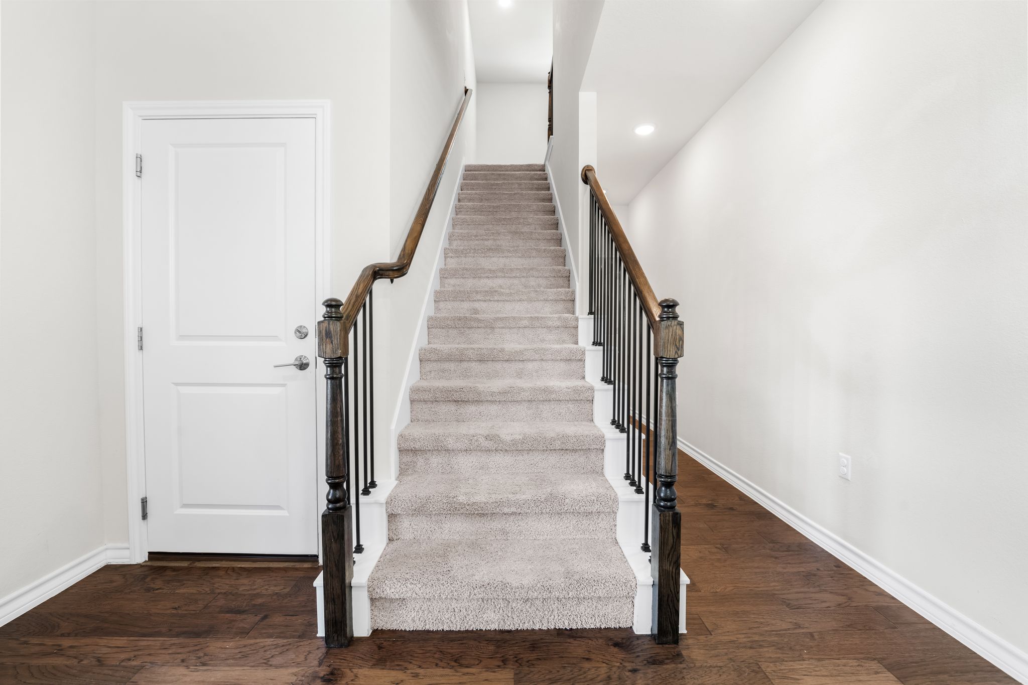 2803 Mary Elizabeth Drive Austin, TX 78728 - Photo 19 of 30 Stairs with wood finished floors and recessed lighting