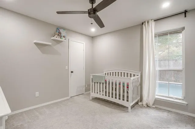 a view of a hallway with sliding door