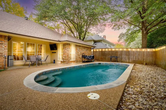 a view of outdoor space yard swimming pool and patio