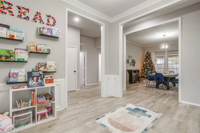 a room with furniture and a wooden floor