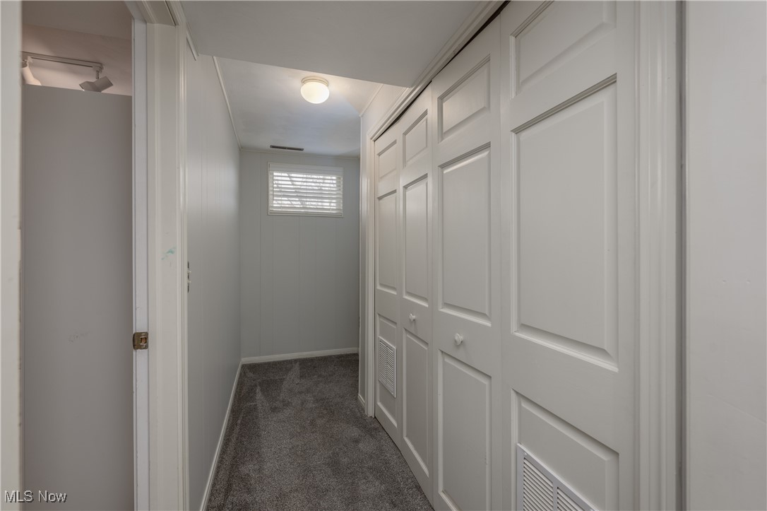3721 20th Street Northwest Canton, OH 44708 - Photo 26 of 47 Hallway featuring dark colored carpet