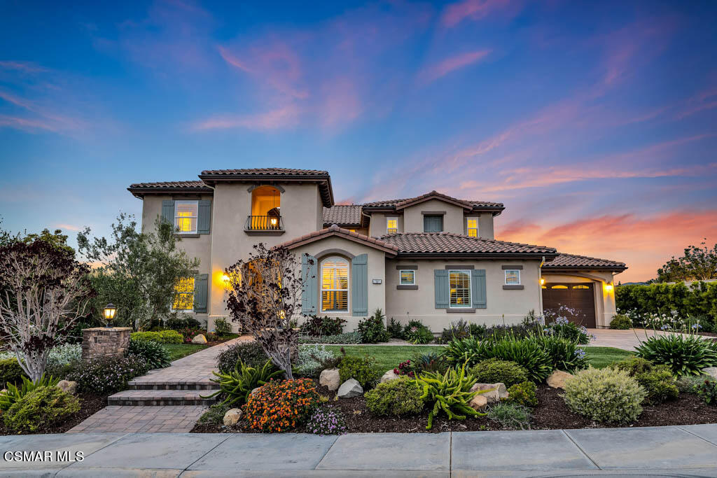 7307 Nicklaus Road Moorpark, CA 93021 - Photo 1 of 96 a front view of a house with a yard