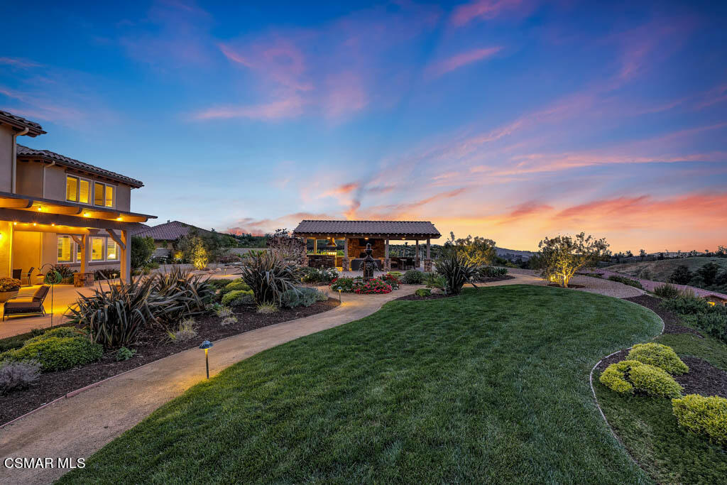 7307 Nicklaus Road Moorpark, CA 93021 - Photo 61 of 96 a view of a garden with cars