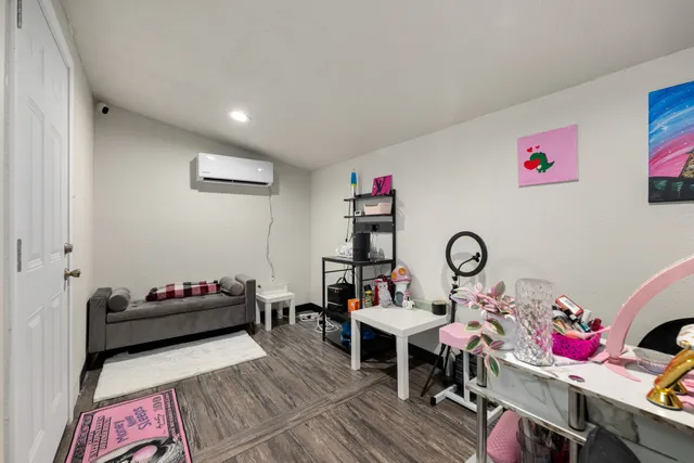 a view of backyard with tub