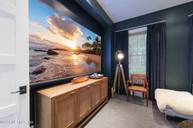 a bathroom with a sink a mirror and a shower