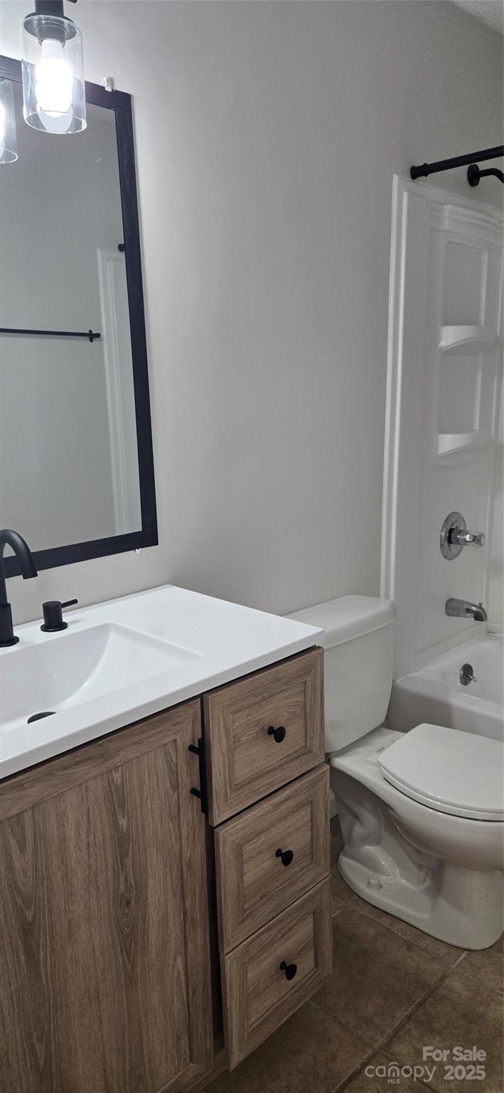 11011 Park Road Charlotte, NC 28226 - Photo 13 of 22 a bathroom with a sink a toilet and a mirror