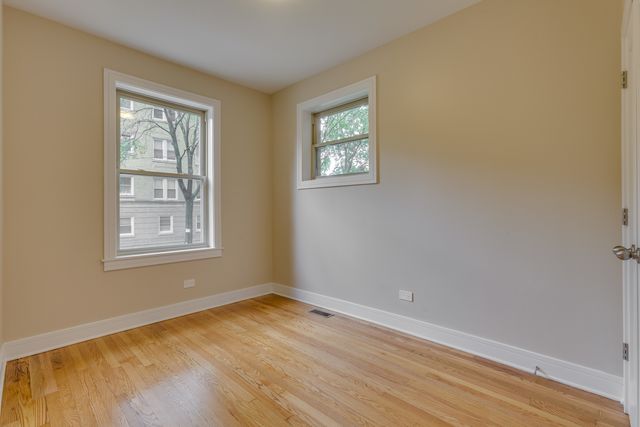 a view of a room that has a window in it