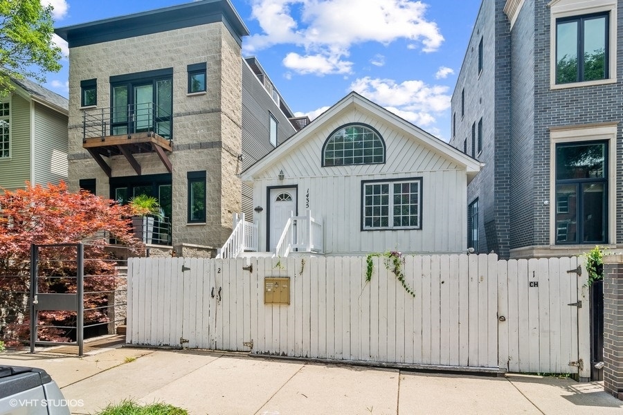 a view of a house with a garage