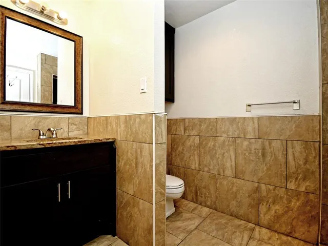 a bathroom with a sink and a toilet