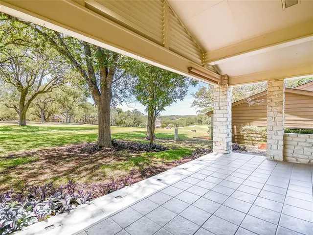a view of a backyard with garden