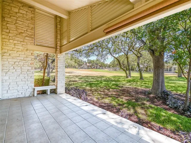 a view of a garden with an outdoor space