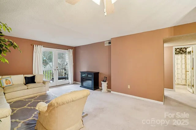 a bedroom with furniture and a fireplace