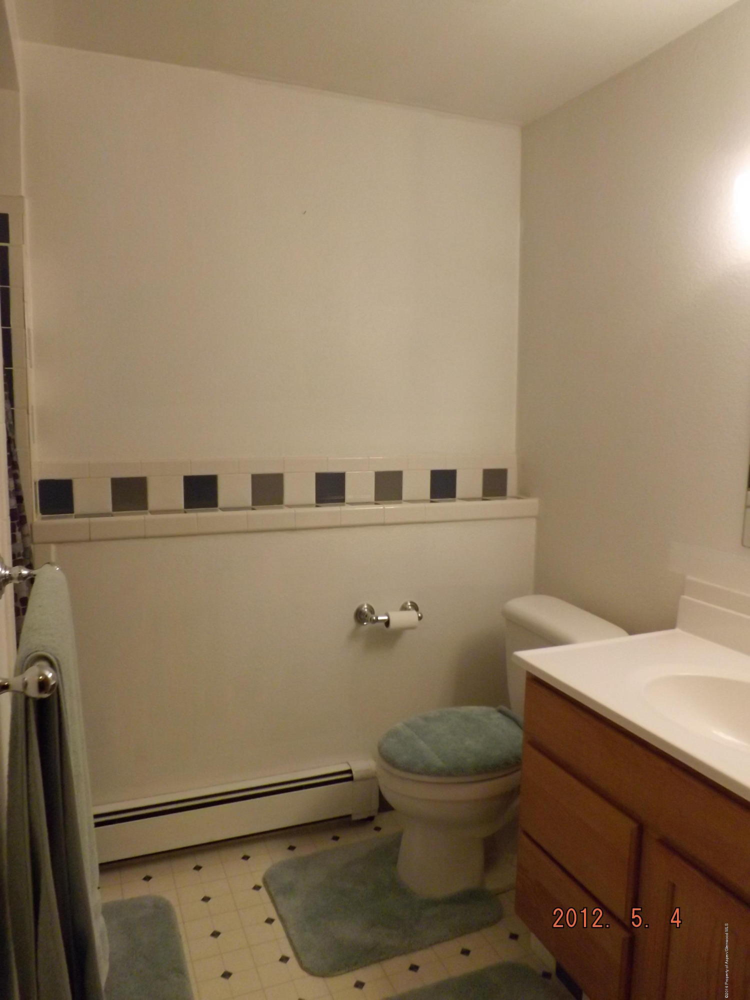 515 East 12th Street Rifle, CO 81650 - Photo 20 of 39 a bathroom with a sink and a toilet