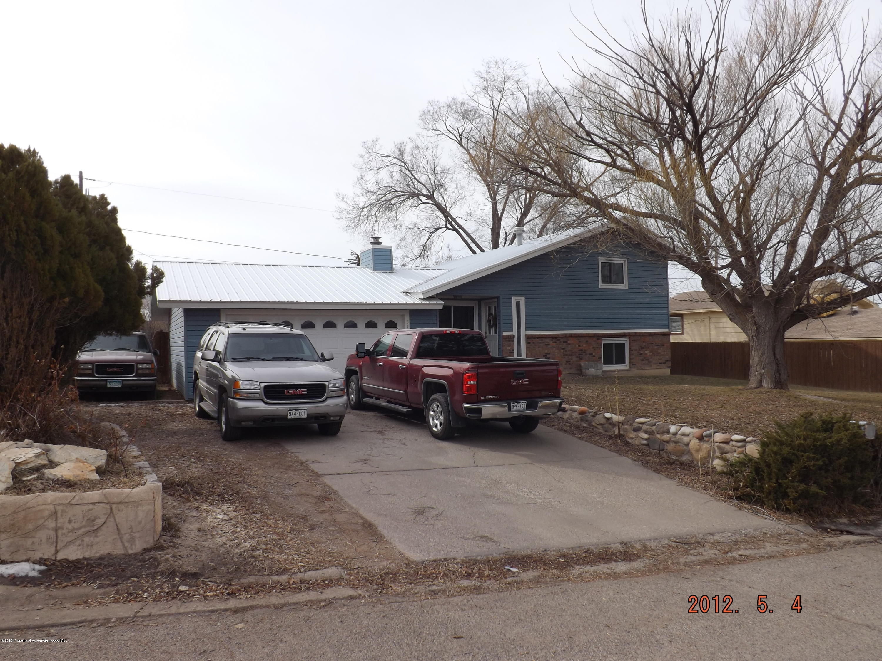 515 East 12th Street Rifle, CO 81650 - Photo 3 of 39 a view of a cars parking space