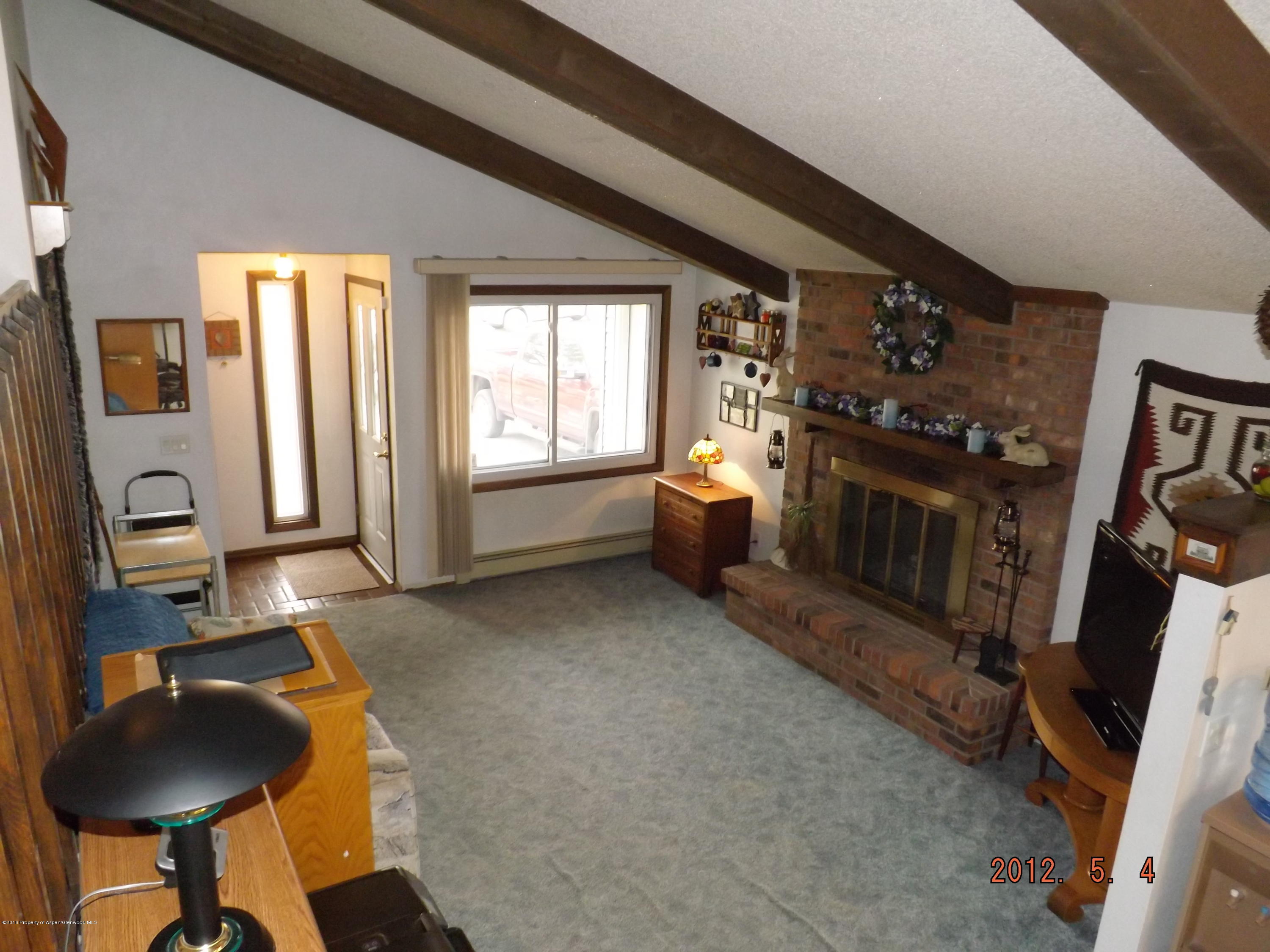 515 East 12th Street Rifle, CO 81650 - Photo 5 of 39 a view of livingroom with furniture and window
