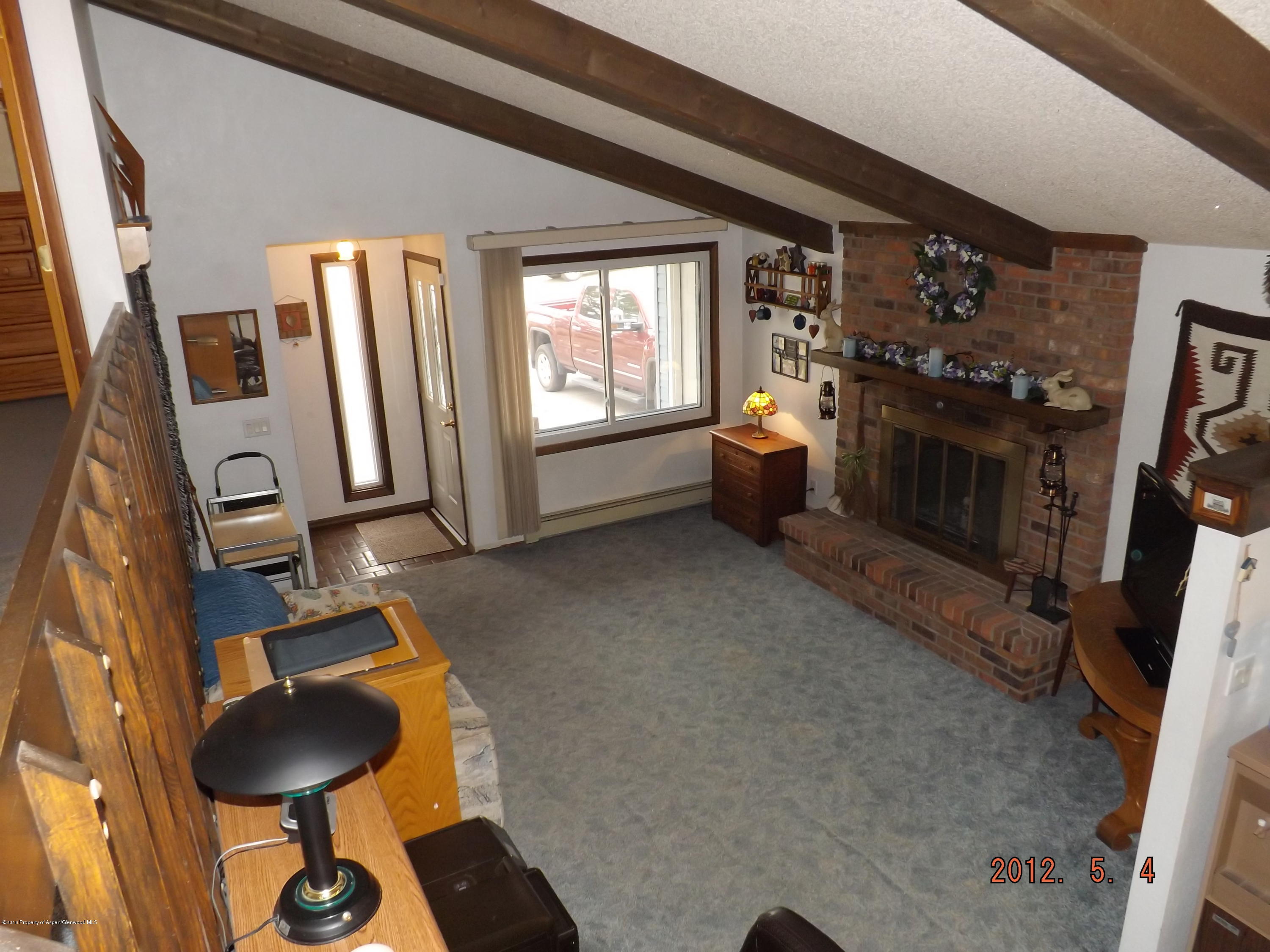 515 East 12th Street Rifle, CO 81650 - Photo 6 of 39 a room with furniture and a window