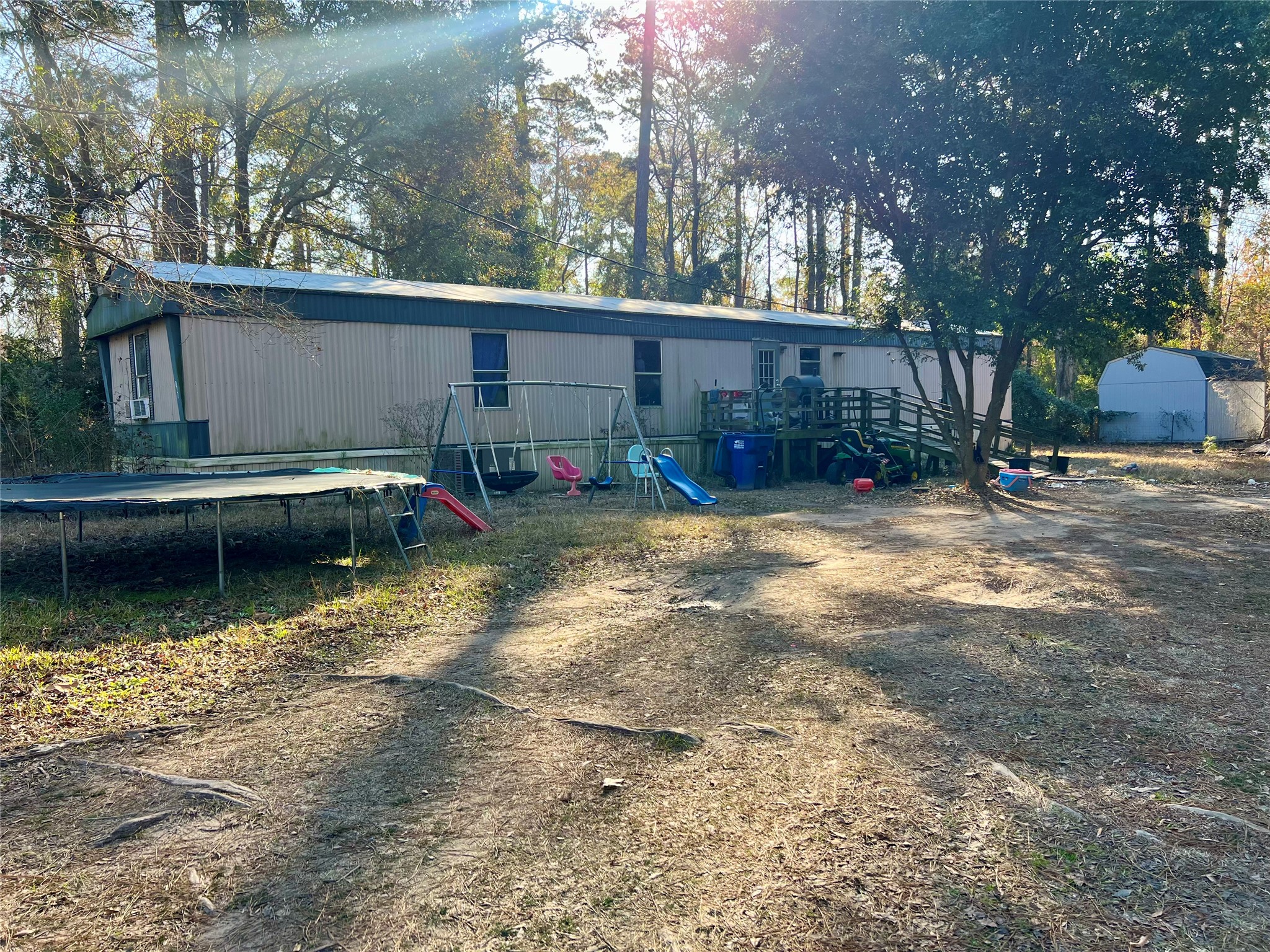 160 Cherokee Lane Onalaska, TX 77360 - Photo 2 of 5 a view of back yard of the house
